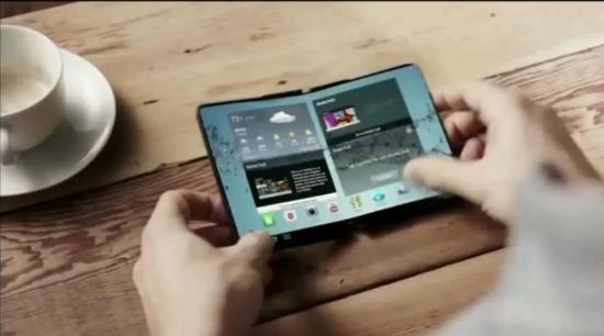 SAMSUNG выпустит смартфоны с гибкими дисплеями в 2014 году. Пример технологии показан в видео.